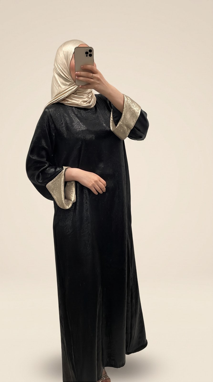 Robe pailletée manches bi-color, noir et doré